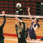 Taylyn Boop tries to tip a ball past two Woodland defenders in her teams first state match. (Mark Krulish/Kitsap News Group)