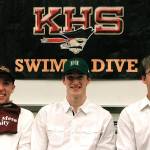Kingston seniors Ethan Fox, Tim Gallagher and Aron Markow have signed their letters of intent to swim at Colorado Mesa University, University of Hawaii and University of Wyoming respectively. (Mark Krulish/Kitsap News Group)