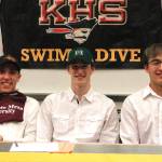 Kingston seniors Ethan Fox, Tim Gallagher and Aron Markow have signed their letters of intent to swim at Colorado Mesa University, University of Hawaii and University of Wyoming respectively. (Mark Krulish/Kitsap News Group)
