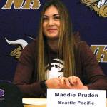 Maddie Pruden signs her letter of intent on Nov. 14 at North Kitsap High School. (Mark Krulish/Kitsap News Group)
