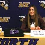 Maddie Pruden signs her letter of intent on Nov. 14 at North Kitsap High School. (Mark Krulish/Kitsap News Group)