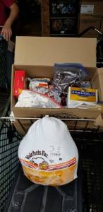 <em>On Nov. 16, Sharenet in Kingston worked to distribute Thanksgiving dinner to those who have sought assistance from the food bank this holiday season.</em>                                Nick Twietmeyer/Kitsap News Group