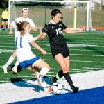 Kate Streck (15) battles for the ball with Deer Parks Carmen Kiewert during the 1A state tournament third place game. (Mark Krulish/Kitsap News Group)