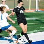 Kate Streck (15) battles for the ball with Deer Parks Carmen Kiewert during the 1A state tournament third place game. (Mark Krulish/Kitsap News Group)
