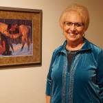 Retiring state Sen. Jan Angel stands next to a portrait of George Washington, which once hung in her office in Olympia. Angel said the portrait holds significance to her as it portrays Washington deep in thought. If this Founding Father had difficulties resolving critical issues, she said, it certainly was reflective of the deliberations she and her fellow legislators routinely faced as lawmakers. (Bob Smith | Kitsap Daily News)