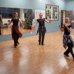 Young dancers perform for onlookers outside The Dance Gallery on Bay Street during the Festival of Chimes and Lights Saturday, Dec. 1. (Bob Smith | Kitsap Daily News)