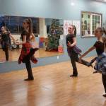 Young dancers perform for onlookers outside The Dance Gallery on Bay Street during the Festival of Chimes and Lights Saturday, Dec. 1. (Bob Smith | Kitsap Daily News)