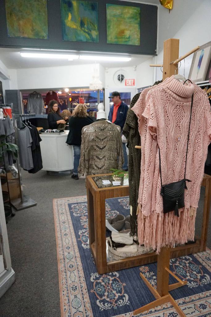 Bay Street small-business merchants, like The N9ne co. womens clothing apparel store, are kept busy during the all-day Festival of Chimes and Lights celebration Saturday, Dec. 1. (Bob Smith | Kitsap Daily News)