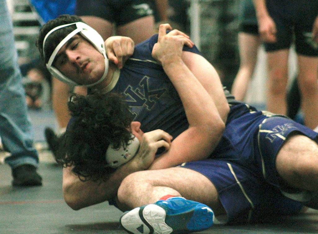Nouh Hammou of North Kitsap completes a 4-0 day with a pin against Bremerton. (Mark Krulish/Kitsap News Group)