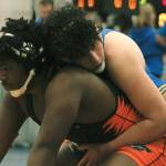 Bremerton wrestler Henry Buentello takes down David McDaniels of Central Kitsap. (Mark Krulish/Kitsap News Group)