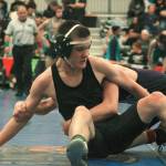 Peyton Hlebechuk of Klahowya takes on North Kitsaps Bryson Hamon in a consolation round match. (Mark Krulish/Kitsap News Group)