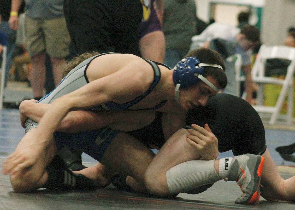 Olympics Tim Porter is a semifinalist at 132. In the third round, he defeated Cole Pass of Washougal by fall in 3:54. (Mark Krulish/Kitsap News Group)