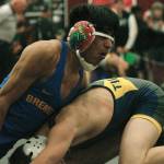 Bremertons Estan Wakonabo takes down Davis Cook of Burlington-Edison. (Mark Krulish/Kitsap News Group)