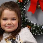 Kaitlin is in the holly-day mood. (Bob Smith | Kitsap Daily News)