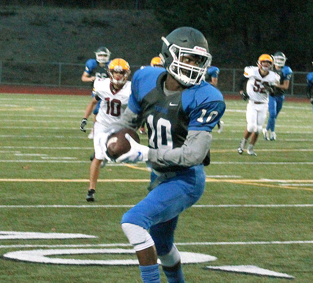 Olympics Adam Johnson was one of the West Sounds best two-way threats. He caught 43 passes for 652 yards and seven touchdowns as a wide receivers and made 20 solo tackles and had six interceptions on defense. (Mark Krulish/Kitsap News Group)