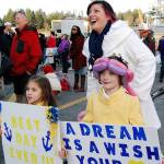 <strong>And a year ago … the Nimitz returns home (Dec. 15, 2017)</strong>                                While the crew of the aircraft carrier USS Nimitz returned home to Naval Base Kitsap-Bremerton just in time for Christmas in December 2017, its worth a second look. The series of photos detailing the Nimitz homecoming won an award in the color photo essay competition in the Washington Newspaper Publishers Association journalism contest. As part of the essay, I followed newlywed Holly Carlson and her family as they anxiously waited for her husband Nicolai to disembark on the gangway.