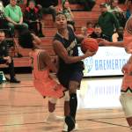 North Kitsap guard Kobe McMillian drives the lane in his teams 62-34 win over Bremerton. (Mark Krulish/Kitsap News Group)