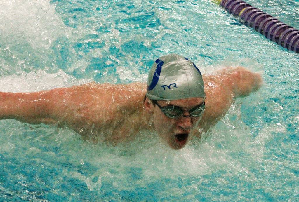 Olympics Haakon Meyer took home the top spot in the 100-yard butterfly event against Kingston. (Mark Krulish/Kitsap News Group)
