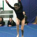 Junko Ketch prepares to tumble in the floor exercises. (Mark Krulish/Kitsap News Group)
