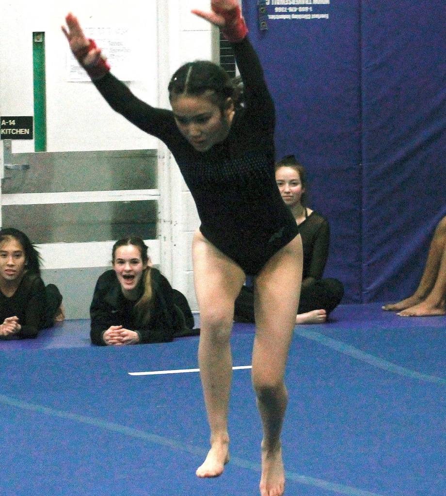 Junko Ketch prepares to tumble in the floor exercises. (Mark Krulish/Kitsap News Group)