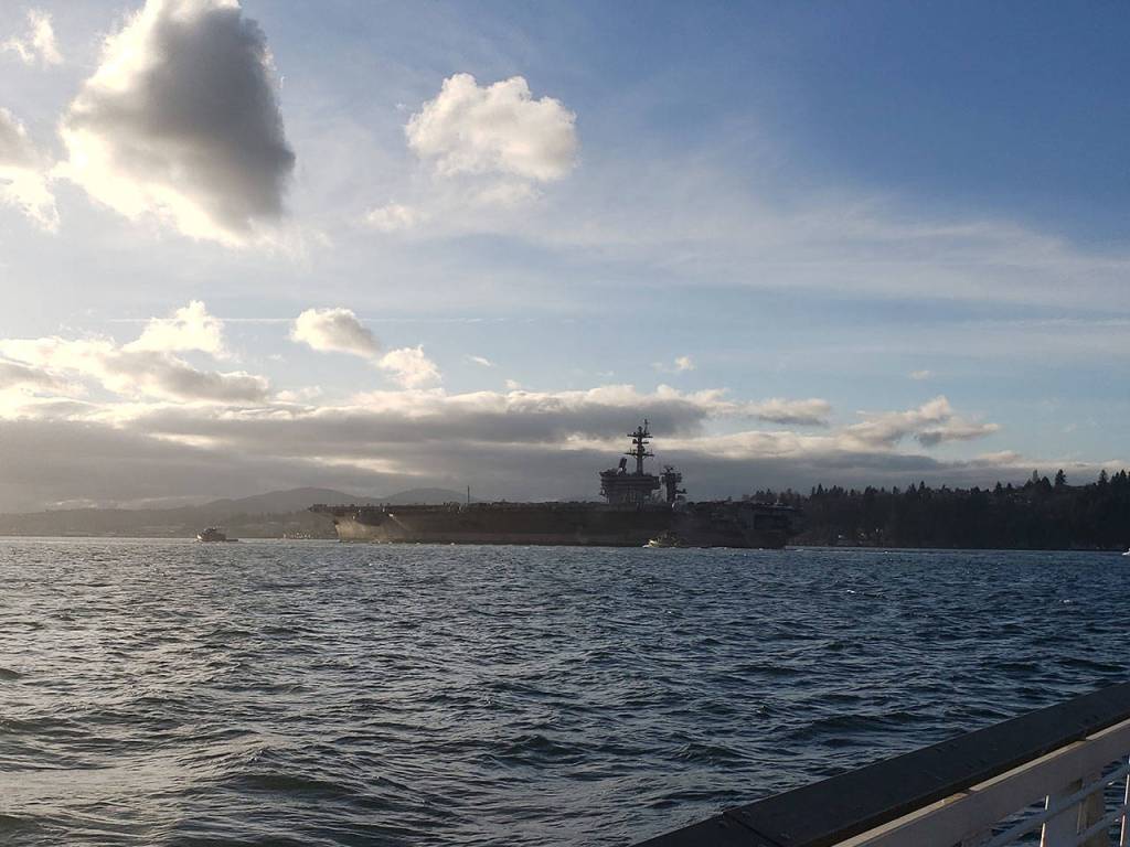 Aircraft carrier docks in Bremerton
