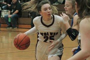 Emma Erickson looks for a lane to the basket against Graham-Kapowsin. (Mark Krulish/Kitsap News Group)
