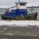 A 64-foot tugboat ran aground near the Port of Brownsville on Monday, February 4, 2019. (Photo by Randy Morgan)