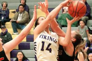 North Kitsaps Noelani Barreith drives the paint in the game against Orting. (Mark Krulish/Kitsap News Group)
