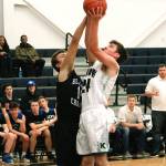Klahowyas Landon Betzing muscles his way past Bellevue Christians Mick Larsen. The Eagles fell 55-28. (Mark Krulish/Kitsap News Group)