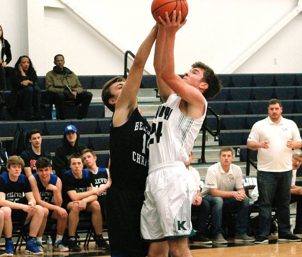 Klahowyas Landon Betzing muscles his way past Bellevue Christians Mick Larsen. The Eagles fell 55-28. (Mark Krulish/Kitsap News Group)