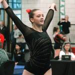 Kingstons Anna Quinn takes part in the floor exercise competition at the state meet. (Mark Krulish/Kitsap News Group)