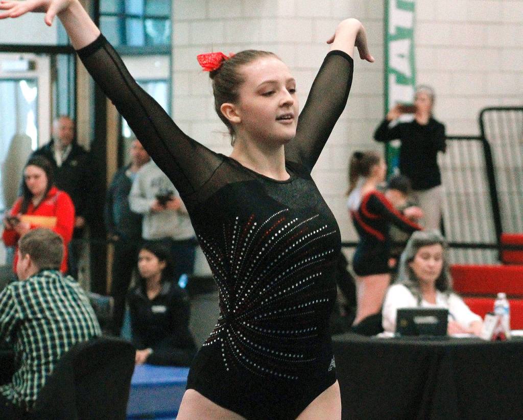 Kingstons Anna Quinn takes part in the floor exercise competition at the state meet. (Mark Krulish/Kitsap News Group)
