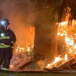 A home at the 6800 block of Sedgwick Road SE in South Kitsap was destroyed by a fully involved fire Tuesday night. The structure fire was extinguished by crews from South Kitsap Fire and Rescue, which used water tenders to supply a steady source of water in fighting the flames. (SKFR photo)