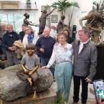 <em>Ardis Morrow and the statues artist Jeff Oens stand next to the bronze sculpture of Eli Creekmore, who was killed by his father in 1986.</em>                                Nick Twietmeyer Kitsap News Group