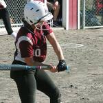 South Kitsaps Jordynn Lawrence strikes a base hit against Rogers. (Mark Krulish/Kitsap News Group)