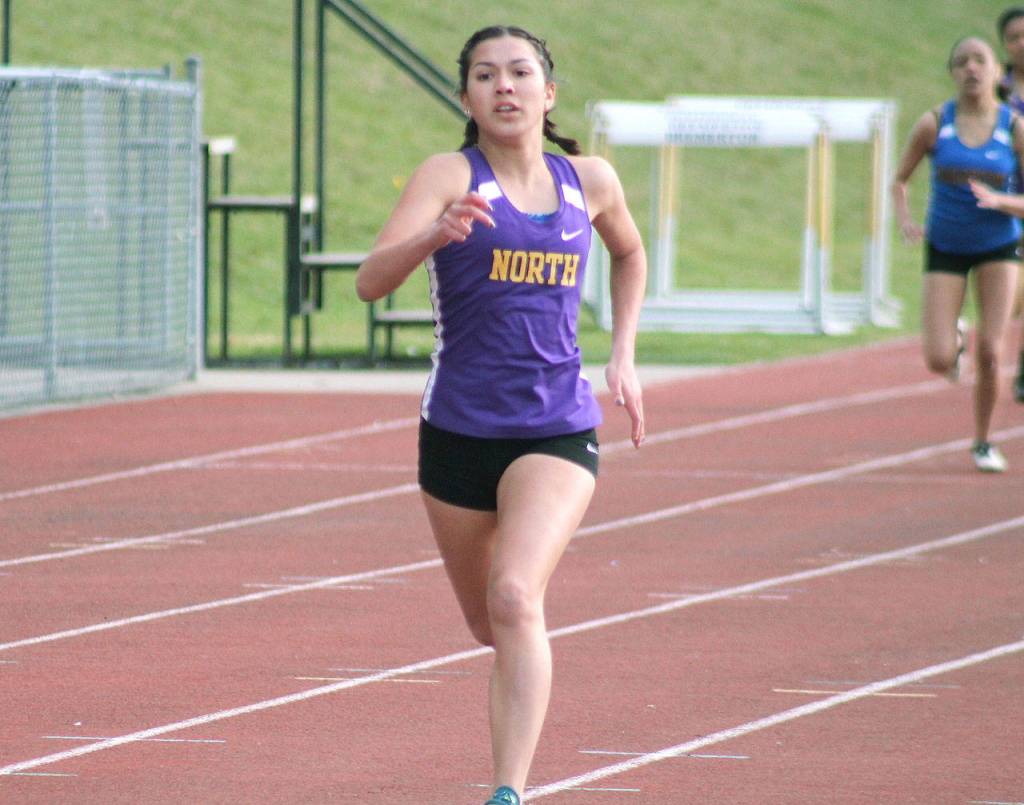 North Kitsaps Genesi Funston wins the 400-meter run in 1:06.83. (Mark Krulish/Kitsap News Group)