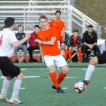 Central Kitsap senior Carter Nilsen slips a pass through the Yelm defense. (Mark Krulish/Kitsap News Group)