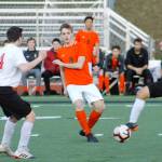 Central Kitsap senior Carter Nilsen slips a pass through the Yelm defense. (Mark Krulish/Kitsap News Group)