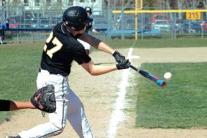 Blake Ballew connects for a base hit during his teams 7-6 win over Central Kitsap. (Mark Krulish/Kitsap News Group)