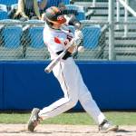 Nate DeSchryver puts the ball in play for the Cougars. (Mark Krulish/Kitsap News Group)
