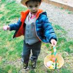 King Leblanc shows off his Easter egg bounty at South Kitsap Regional Park. (Bob Smith | Kitsap Daily News)