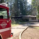 Fire crews battled an aggressive house fire on Southeast Lund Avenue March 30 that spread throughout the interior. One person was critically burned while attempting to put out the first with a garden hose. (SKFR photo)
