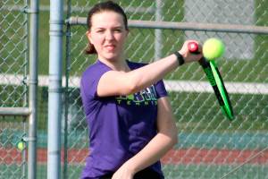 <em>Geneva Newell returns a serve against Klahowya.</em>                                Mark Krulish/Kitsap News Group