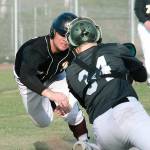 Jacob Duarte dives for the plate in the seventh inning against Emerald Ridge, but a good throw resulted in an out. (Mark Krulish/Kitsap News Group)