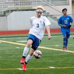 Bremertons Carter Braunz get the ball and looks to turn up field against Olympic. (Mark Krulish/Kitsap News Group)