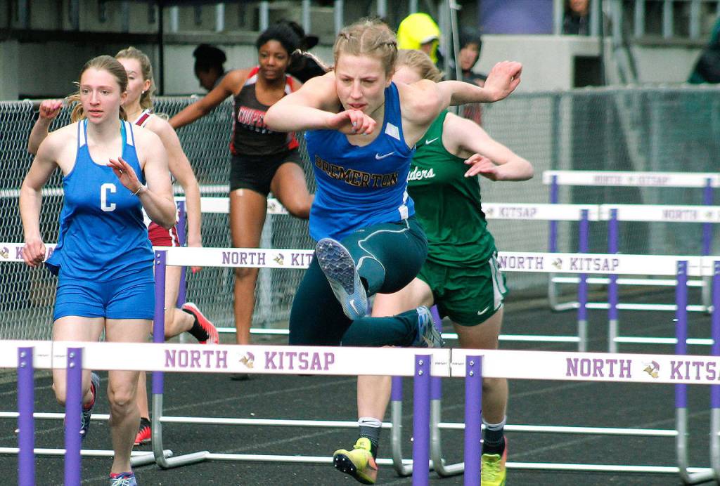 Lauryn Chandler cruises to victory in the 100-meter hurdles. (Mark Krulish/Kitsap News Group)