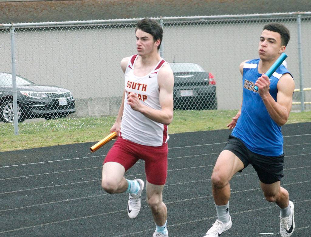 Scott Cmelo of South Kitsap races out of the starting blocks next to Bremertons Garrett Kline. (Mark Krulish/Kitsap News Group)