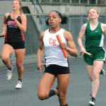 Kymeal Gauldin of Central Kitsap takes the baton to the finish line in the 4x400 relay. (Mark Krulish/Kitsap News Group)