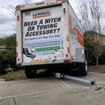 Freewheeling U-Haul trailer, comes loose from hitch, smashes into crosswalk pole in Poulsbo