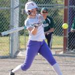 Sarah Smith blasts a single to right against the Roughriders. (Mark Krulish/Kitsap News Group)